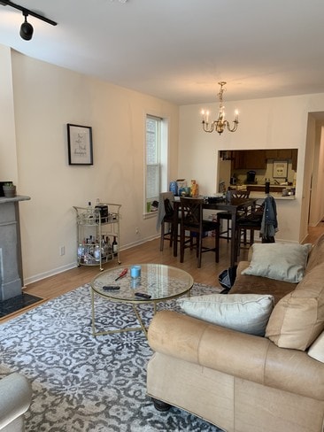 Open concept living / dining room - 2015 N Fremont St Apartments