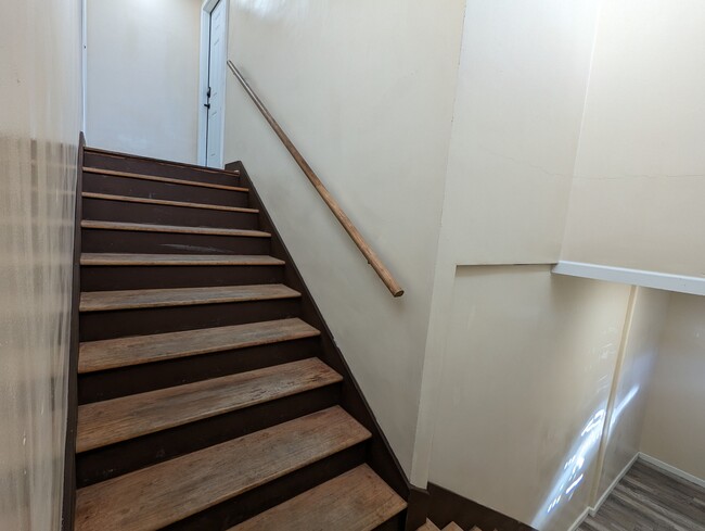 Hallway up the stairs to the unit - 613 4th St