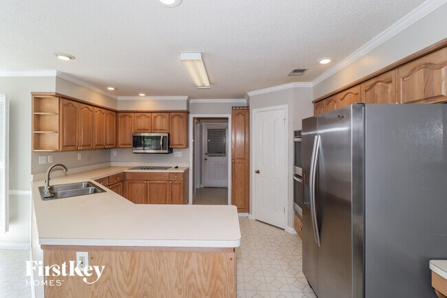 Foto del edificio - 8410 Walnut Tree Dr