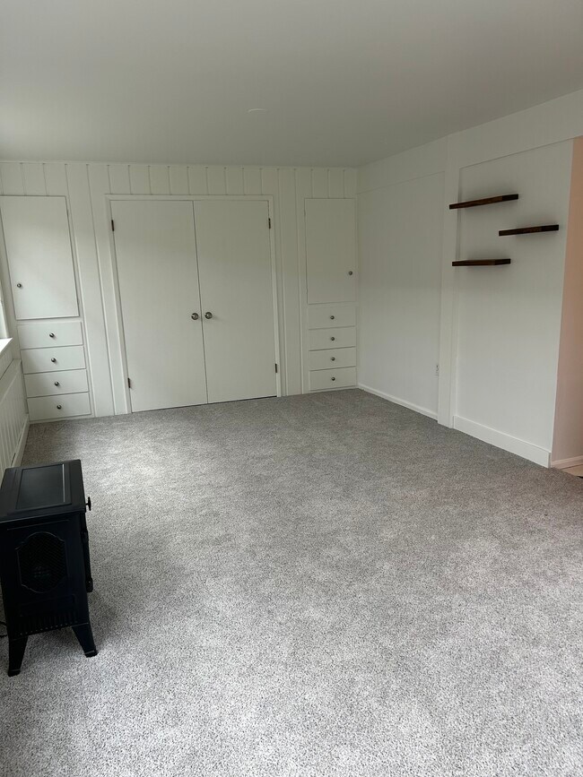 Back of living room has storage & closets - 908 NW 105th St