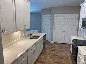 Building Photo - 9238 E River Dr