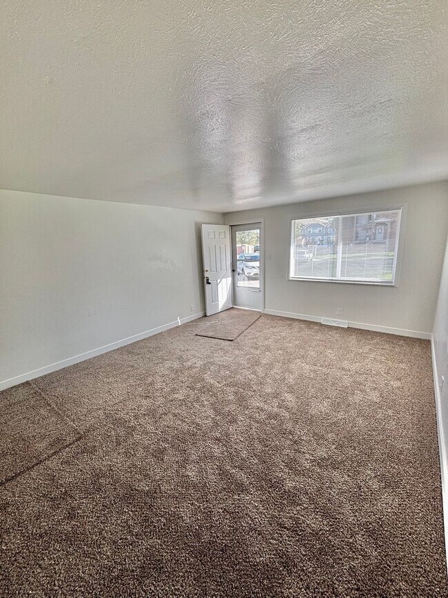 Photo - 8469-8479 W. 52nd Place Apartment