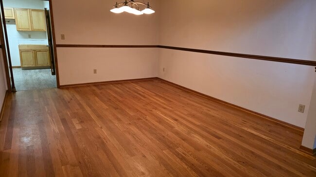 Large dining room with wood floor - 620 East St S