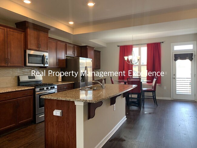Building Photo - Amazingly Located Townhome, Featuring 3 Be...