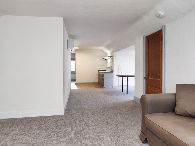 Looking from living room past dining area towards kitchen - 138 Cypress Ave. E
