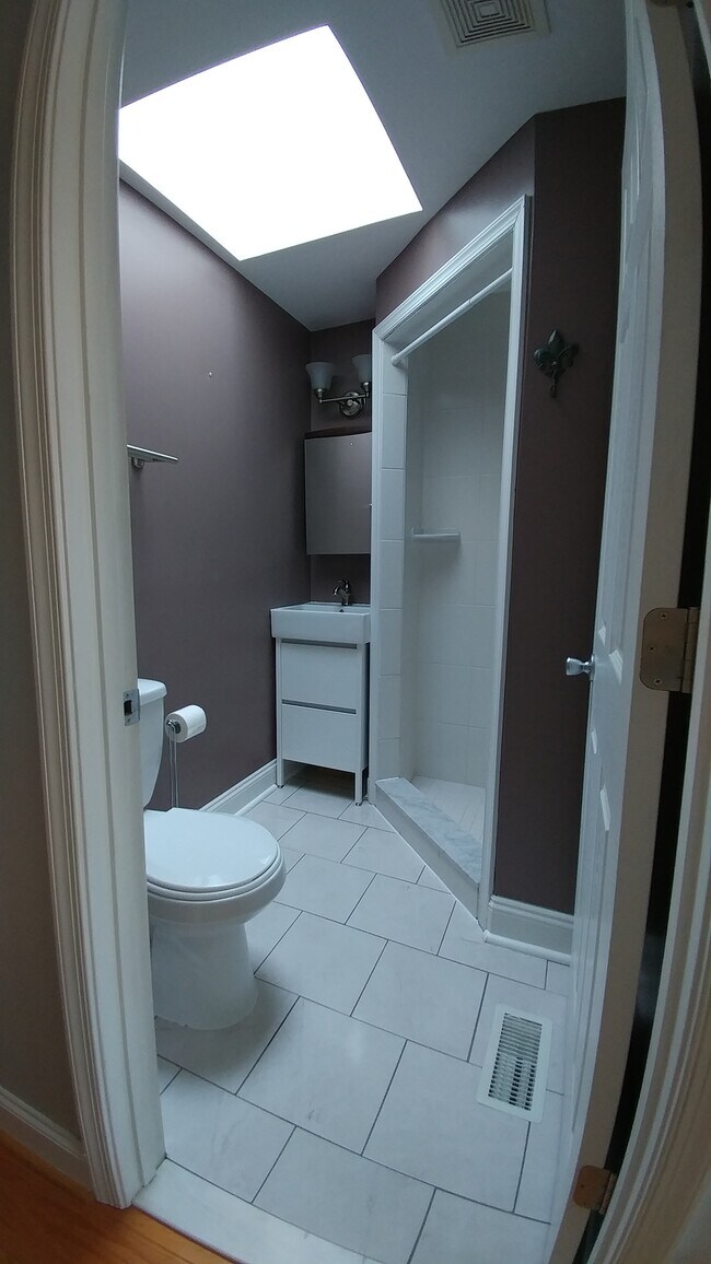 2nd floor hallway full bathroom with shower stall - 3115 Fleet Street