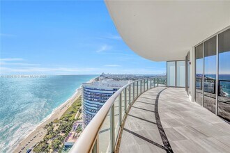 Building Photo - 9703 Collins Ave