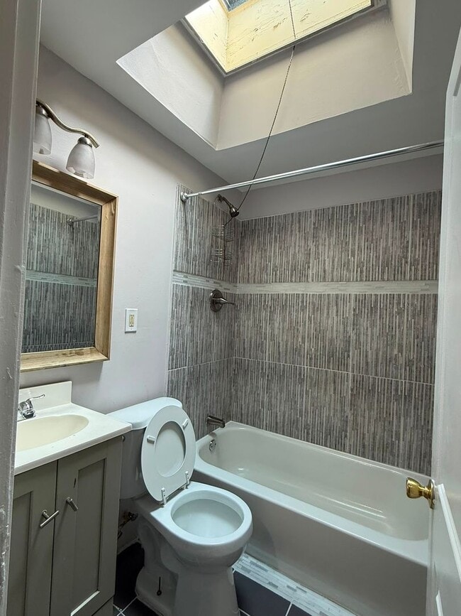 Photo - Spacious 2BR Home with Finished Basement  Central Air  $1,600/month