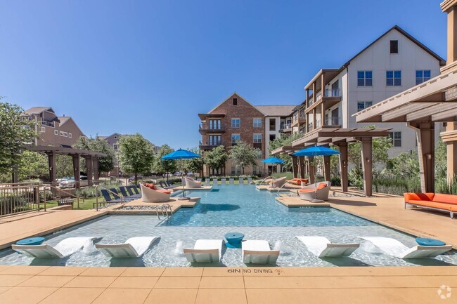 Infinity Pool with Sun Ledge & Lounge Seating - The Austin at Trinity Green