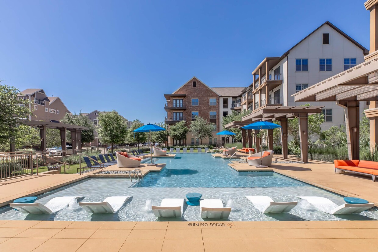 Infinity Pool with Sun Ledge & Lounge Seating - The Austin at Trinity Green