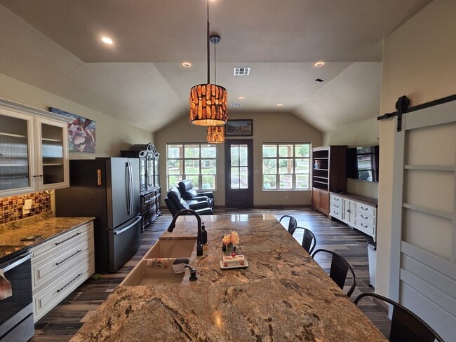 Building Photo - Custom built unit! Country Living!  Fully furnished!