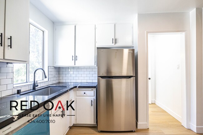 Building Photo - Incredible Dual Level Bright, Spacious, An...
