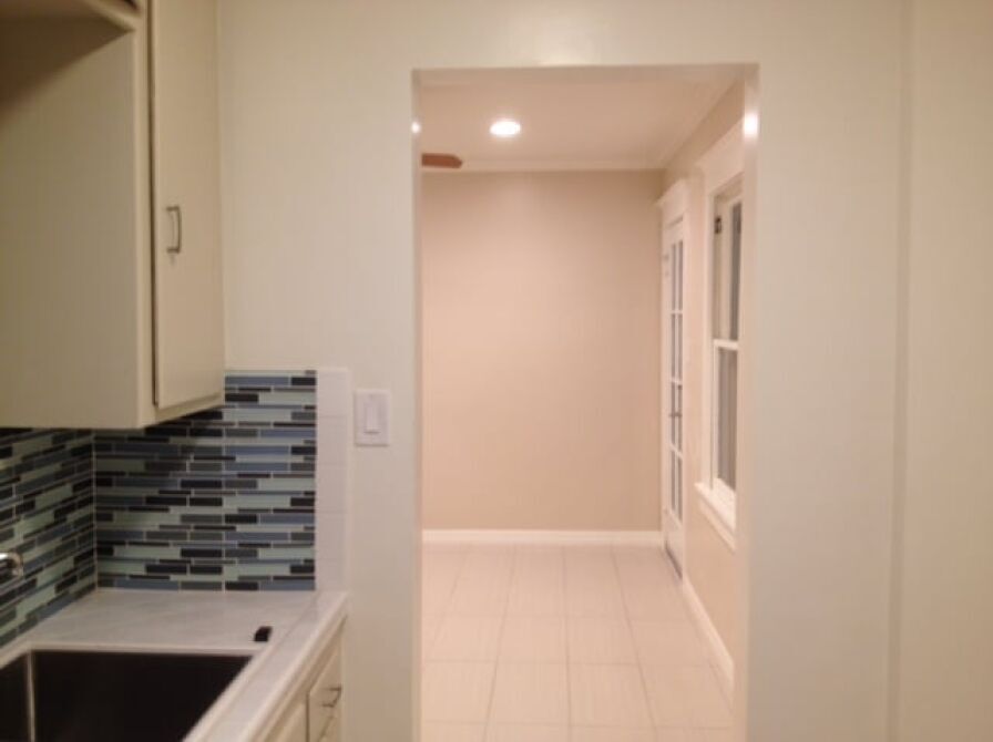 From kitchen looking into the main room with recessed LED lighting on dimmer - 1314 N Vista St
