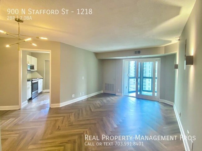 Building Photo - Stunning, Sky High Condo- Elevator to Ball...