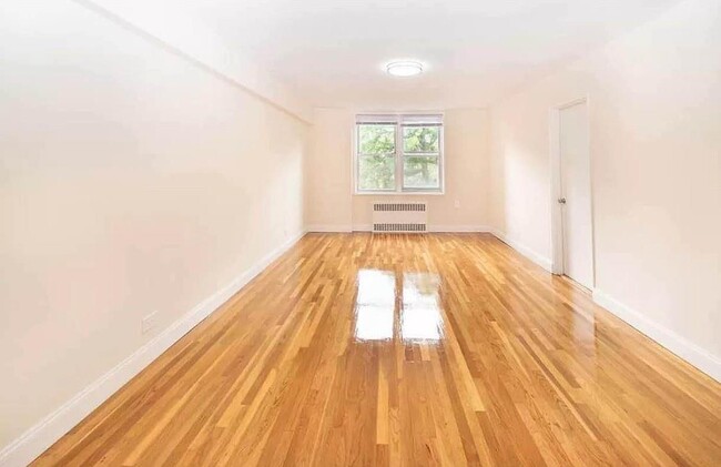 Building Photo - 55-05 Woodside Ave