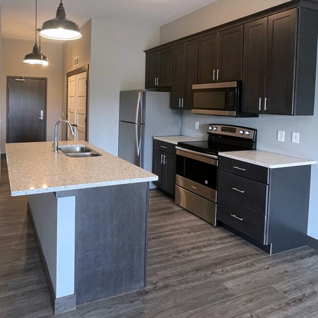 Building Photo - NewBo 2BR with High Ceilings & In-Unit Laundry