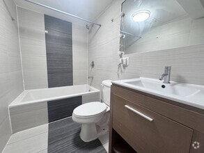 Building Photo - 10916 Woodley Ave
