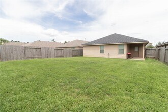 Building Photo - 24423 Raindrop Poppy Dr