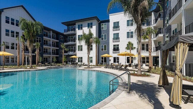 Welcome to Eastborough Apartments, where modern living meets comfort. Enjoy a stunning poolside oasis surrounded by lush landscaping and contemporary design. Elevate your lifestyle in a vibrant community. Schedule your tour today! - Eastborough Apartments