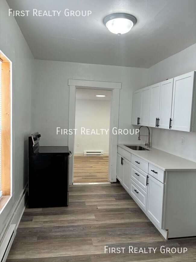 Foto del edificio - 104 1/2 E. Pearl Street-