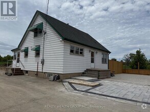Building Photo - 12190 Warden Ave.
