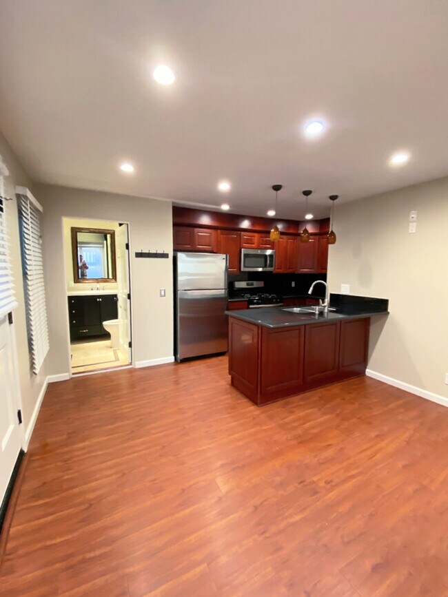 Living and kitchen area - 2613 Manhattan Ave