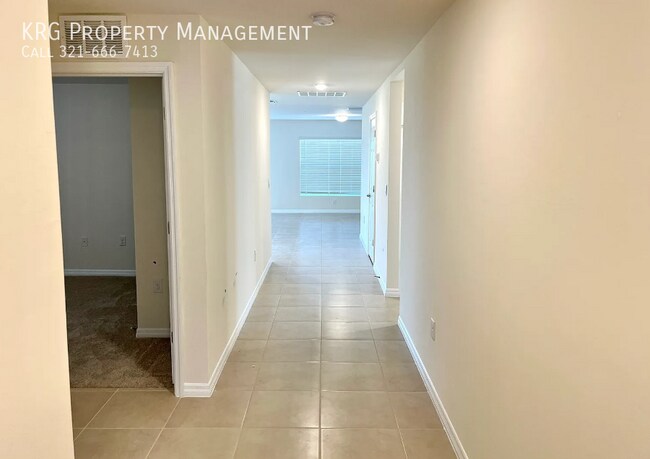 Building Photo - 7009 Blue Cypress Way