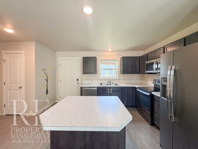 Building Photo - Hilltop Port Orchard Home with Open Living & Fenced Backyard