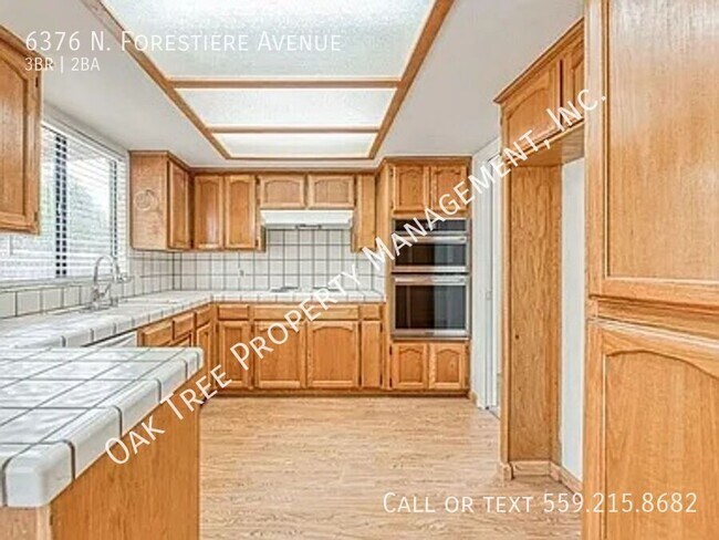 Foto del edificio - 6376 N Forestiere Ave