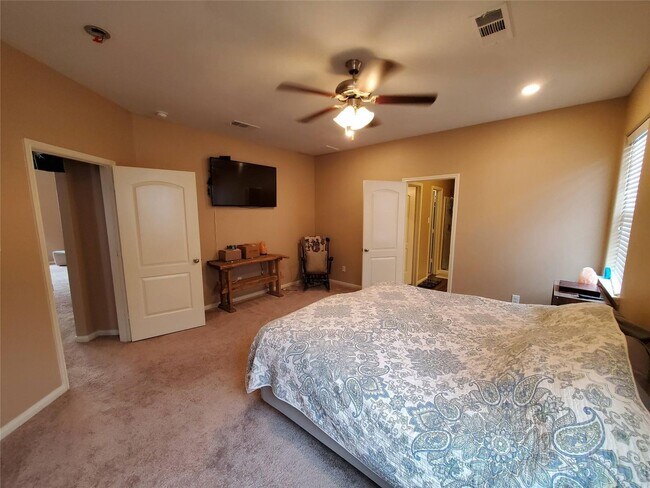 Building Photo - A beautifully maintained, smart-ready four-bedroom home in Stone Creek Ranch with modern finishes...