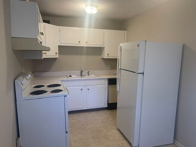 Foto del edificio - Convenient Location, First Floor Condo