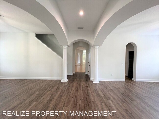 Building Photo - 6 br, 5 bath House - 7121 Blue Indigo Cres
