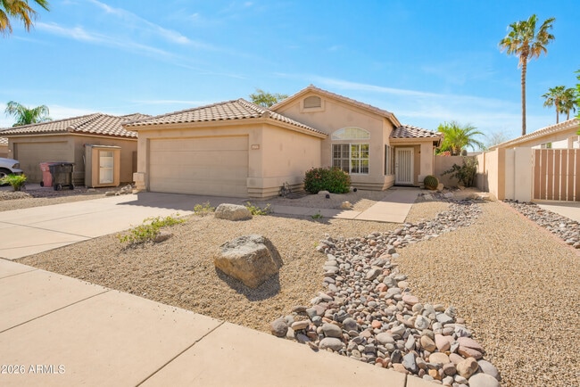 Building Photo - 9321 E Caribbean Ln