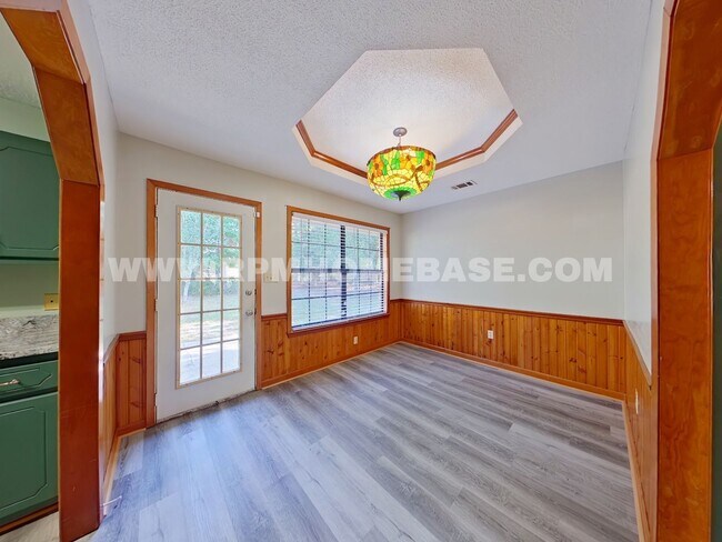 Building Photo - Charming 3-Bedroom Corner Lot Home with Sp...