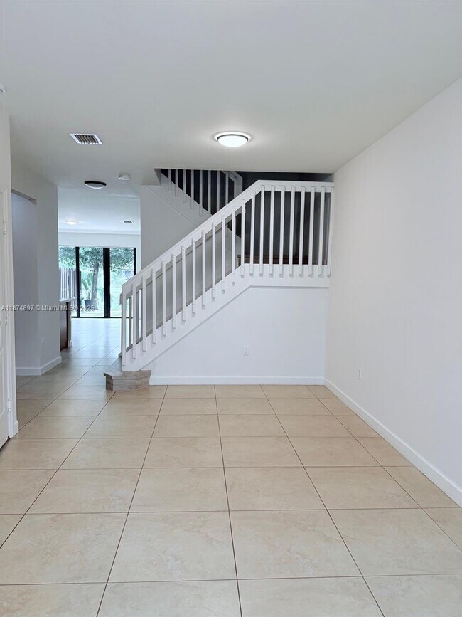 Building Photo - 5980 NW 104th Ct