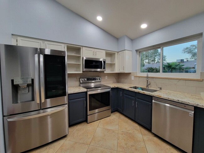 Building Photo - Tastefully decorated home with NO CARPET