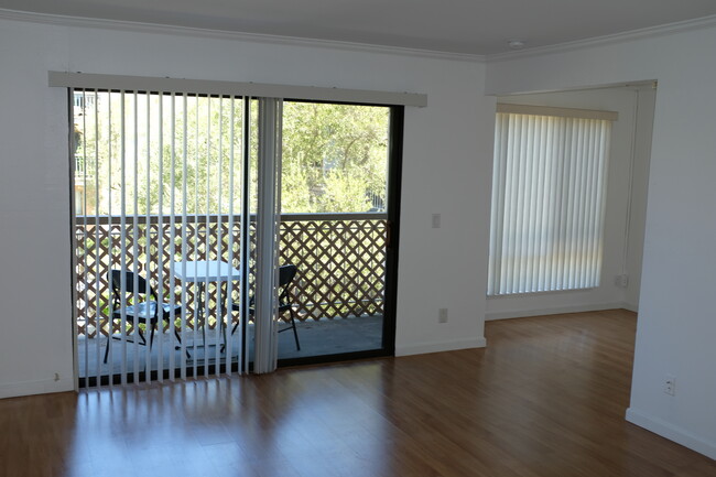 Living room with dinina area at right - 330 N Civic Dr