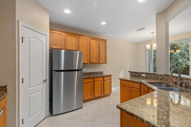 Building Photo - "Elegant 4-Bedroom Home in the desirable S...