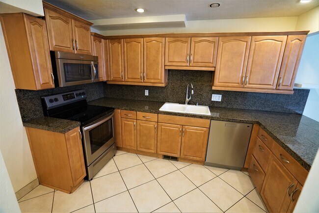 Kitchen with Updated Countertops and Cabinetry - 1797 S Laurelhurst Dr