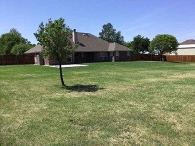 Building Photo - COMING SOON!!! Beautiful 5/15/2 - NEW FLOORING - Great OUTDOOR LIVING - ALEDO ISD