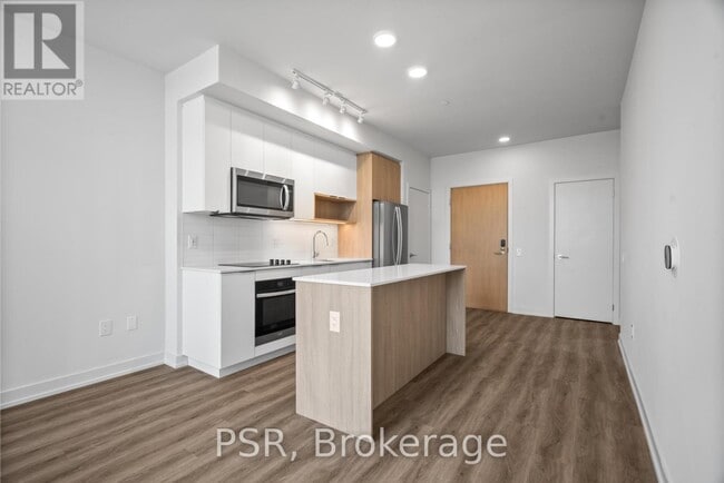 Photo du bâtiment - 4235-4235 Confederation Pkwy