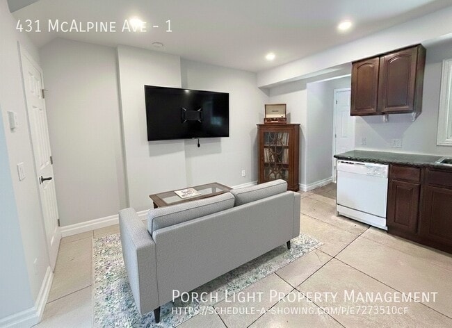 Building Photo - Main Floor With Parking, Laundry, Yard and Plenty of Storage