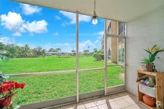 Building Photo - 6550 Royal Palm Blvd