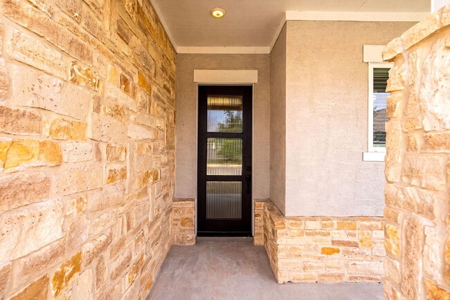 Building Photo - Greenbelt. 3 Car Garage. Built In Dog Room.