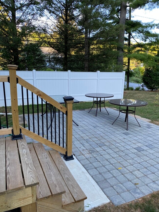 Back patio looks out to green space. - 3054 S Pike Ave