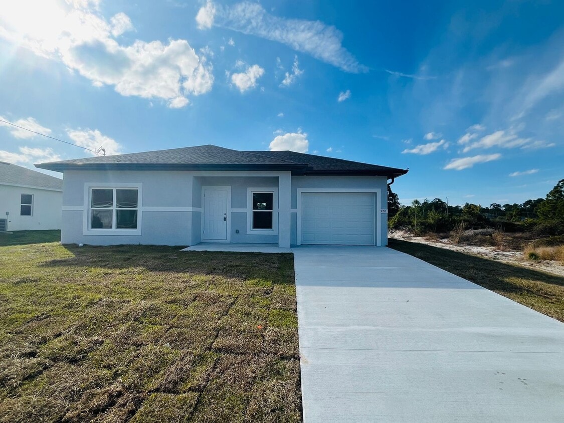 Brand-New Modern 2BR/2BA Home with Garage on Oversized Lot – Prime SW Lehigh Acres Location - Brand-New Modern 2BR/2BA Home with Garage on Oversized Lot – Prime SW Lehigh Acres Location