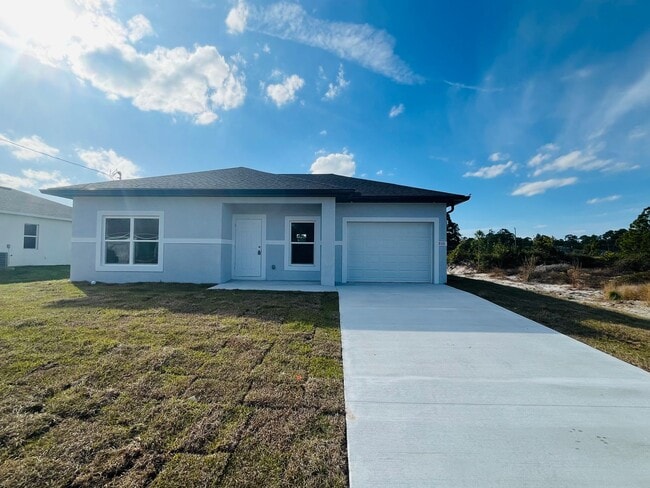 Brand-New Modern 2BR/2BA Home with Garage on Oversized Lot – Prime SW Lehigh Acres Location - Brand-New Modern 2BR/2BA Home with Garage on Oversized Lot – Prime SW Lehigh Acres Location