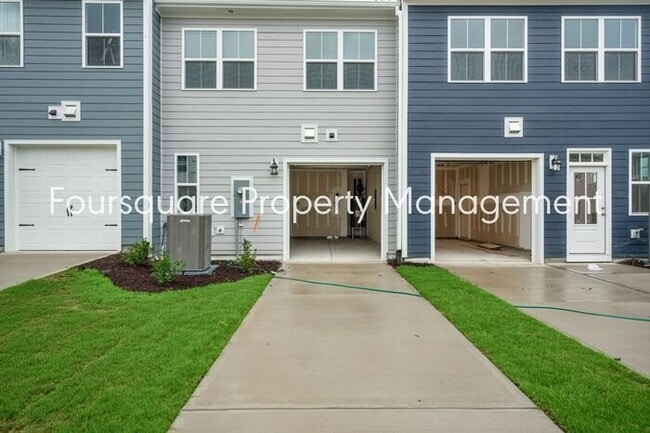Building Photo - 2 Story Townhouse | One Car Garage | Hardw...