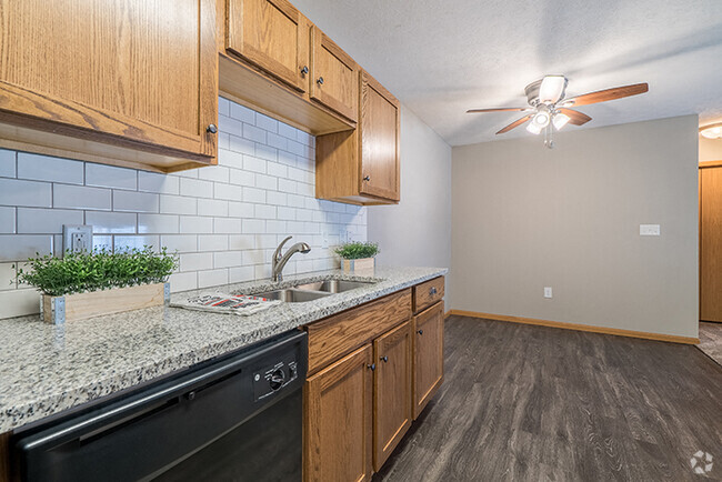 Our upgraded homes include updates like new flooring, appliances, cabinets, and more. - Williamsburg Park Apartments