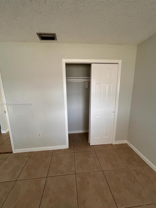 Building Photo - 9061 NW 25th Ct